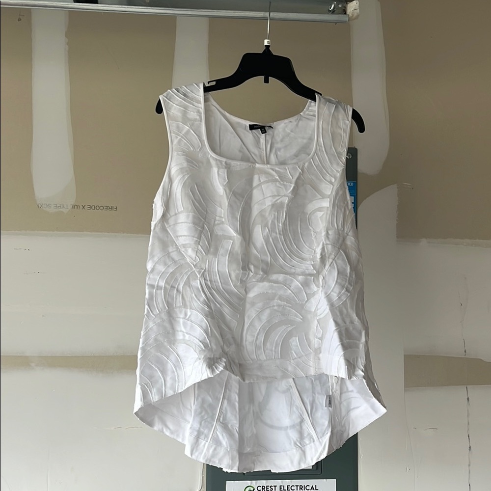 White Sleeveless Blouse with Textured Pattern